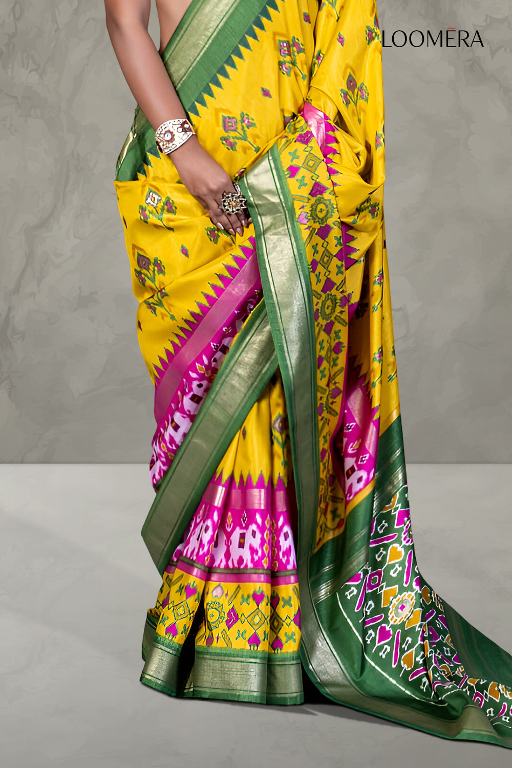 Marigold Yellow Patola Saree with Green Zari Border