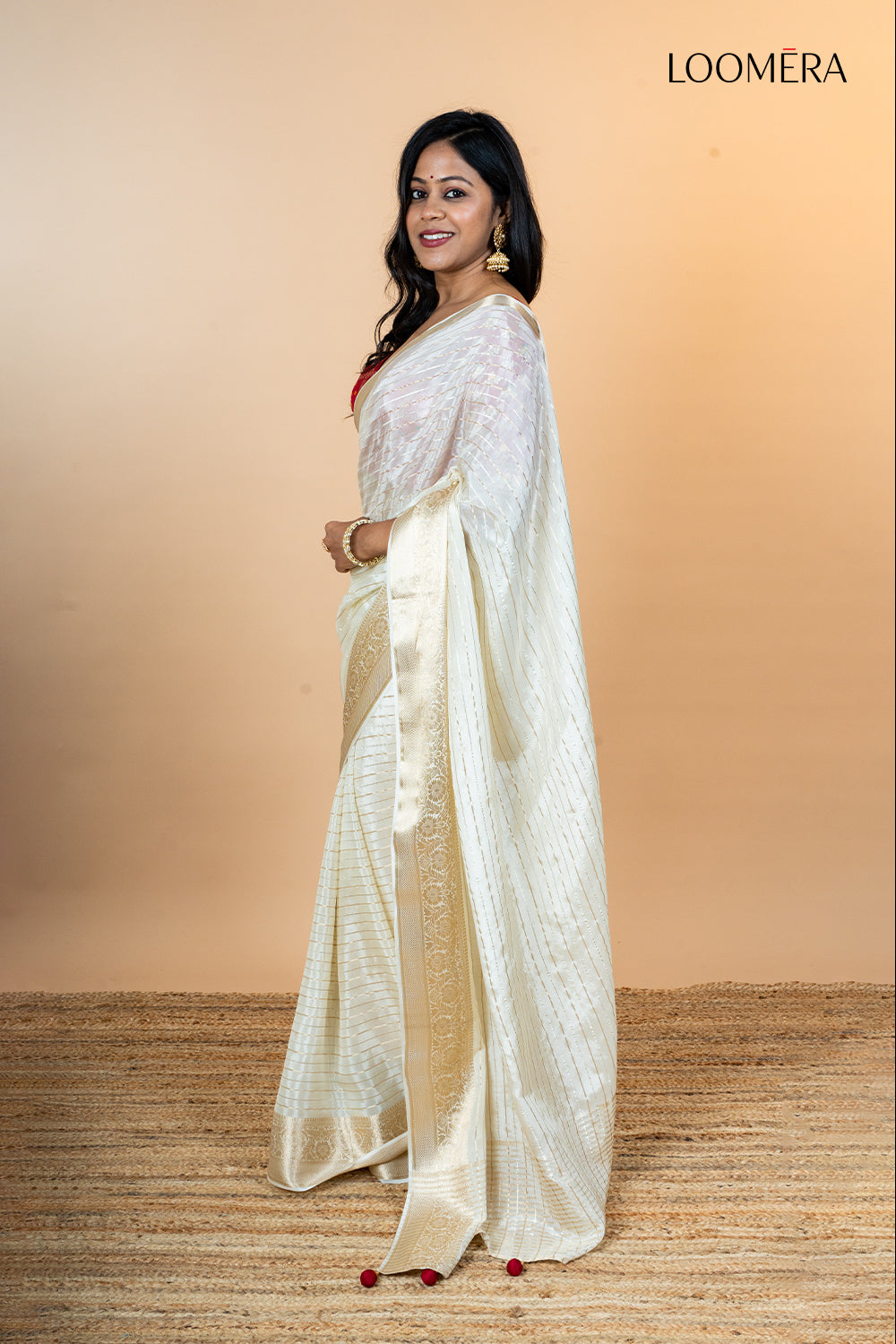 Off White Viscose Silk saree with Zari Border