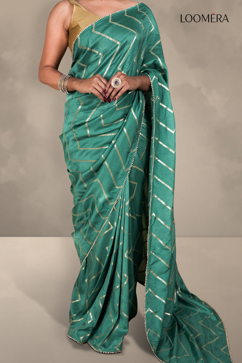 Teal Green Saree with Golden Zari Weave