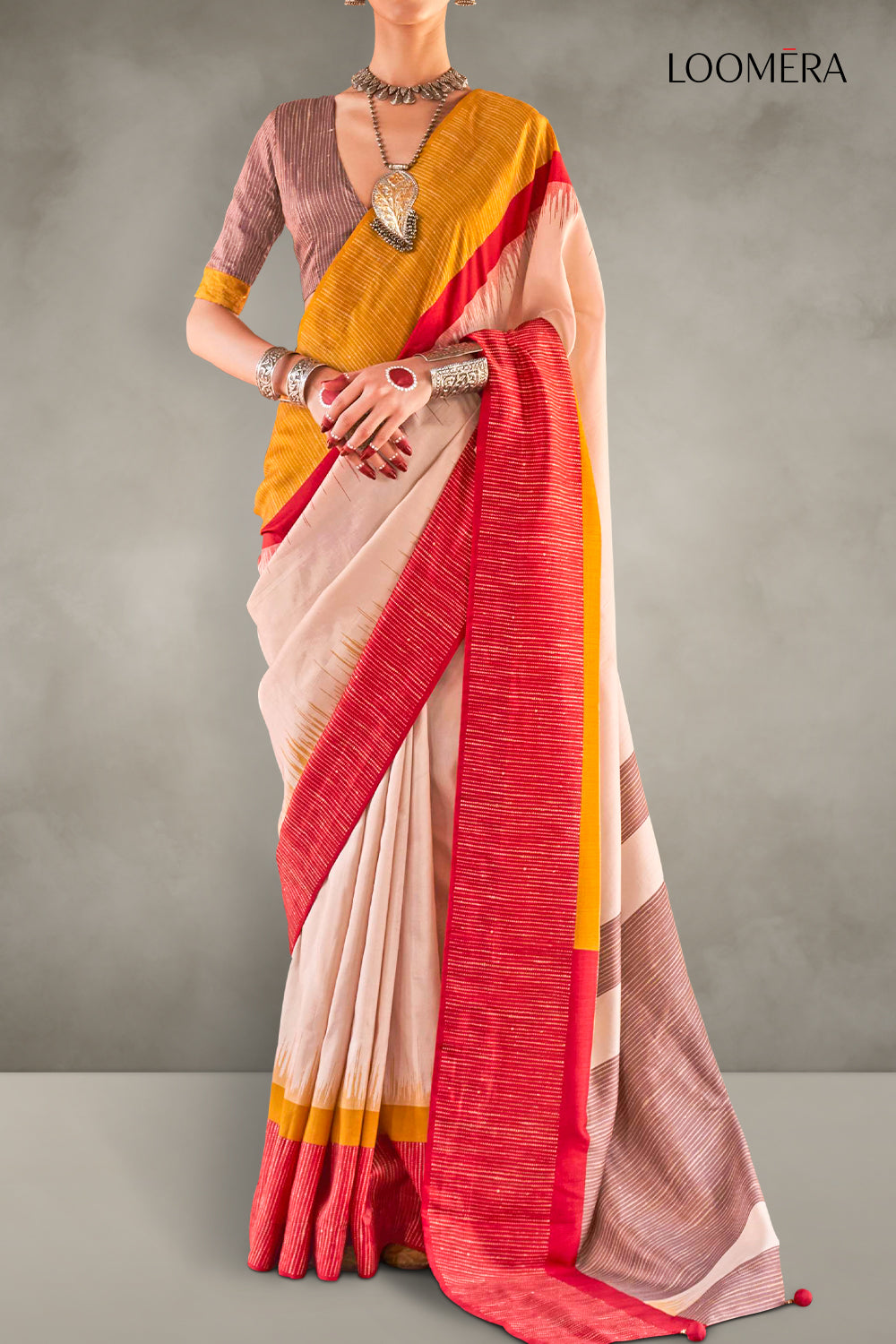 Beige Saree with Red and Yellow Border