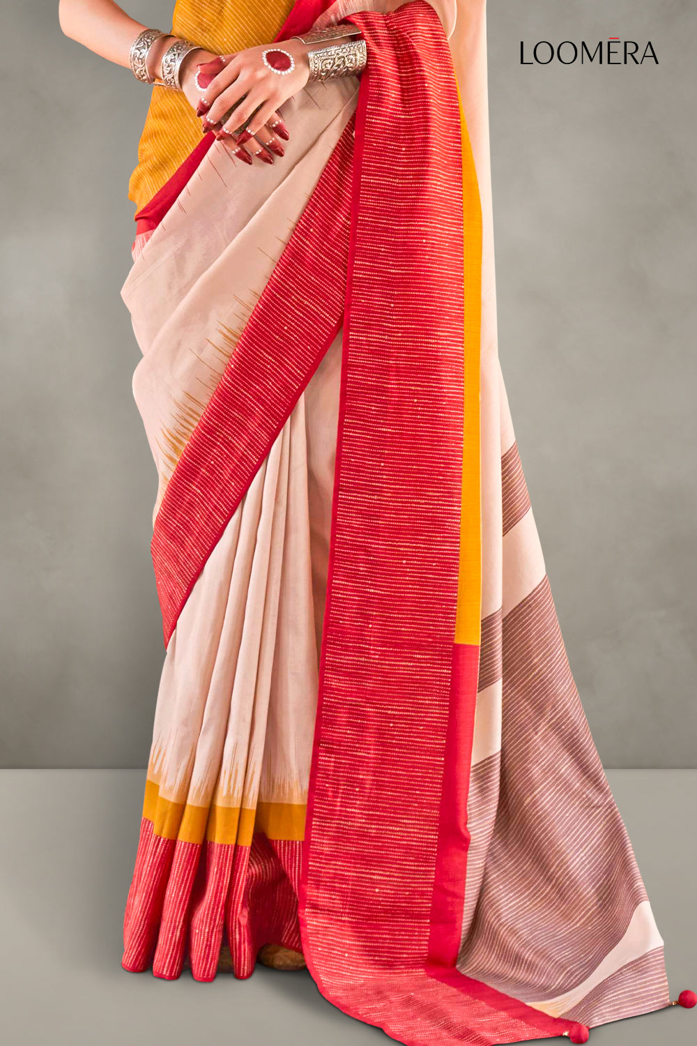 Beige Saree with Red and Yellow Border