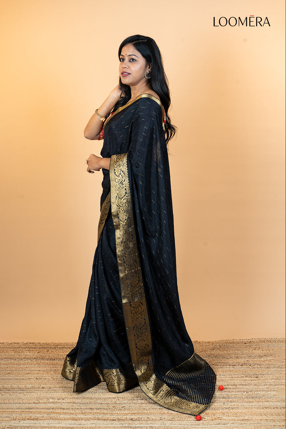 Black Saree with Golden Saree Border