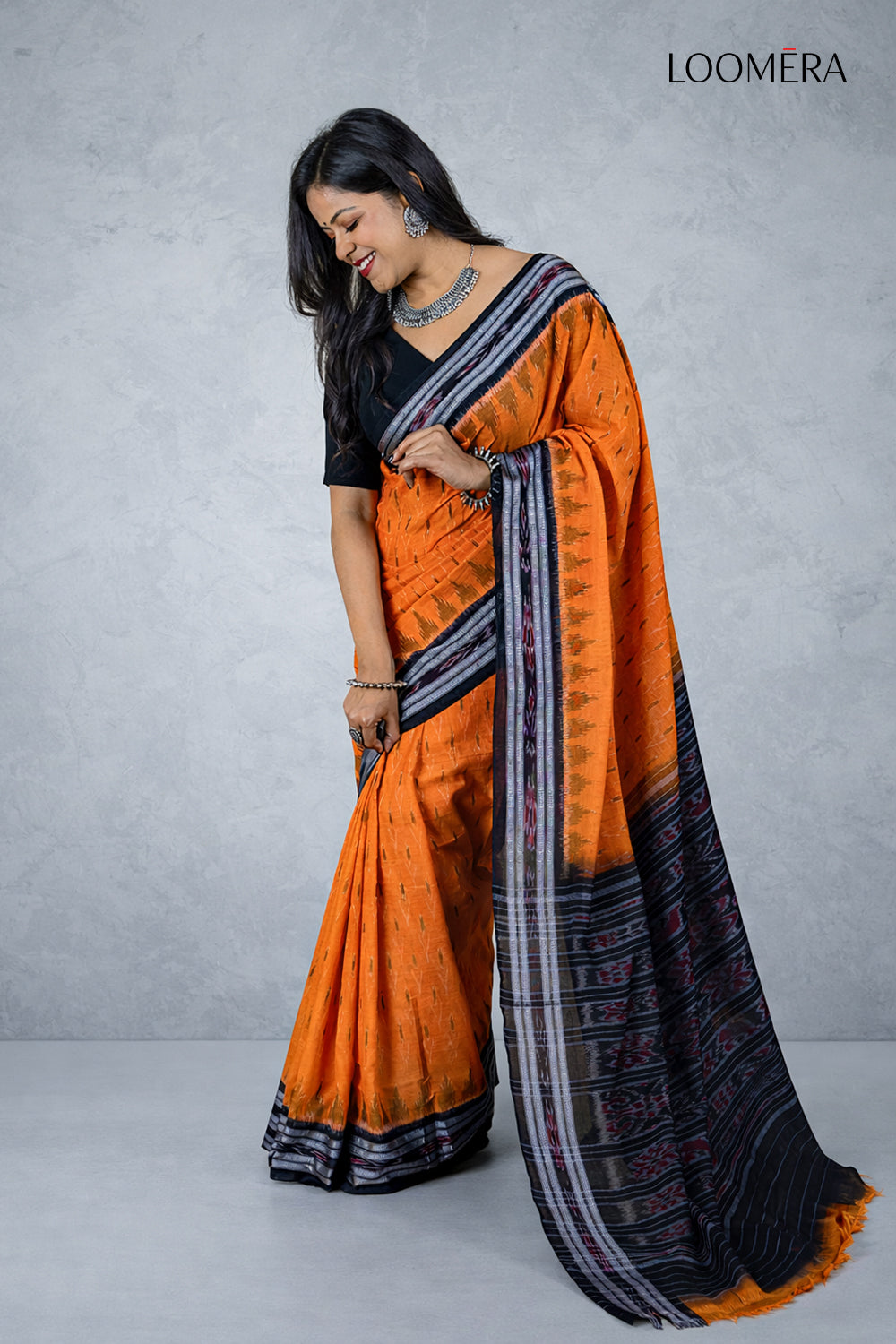 Orange and Black Ikat Saree