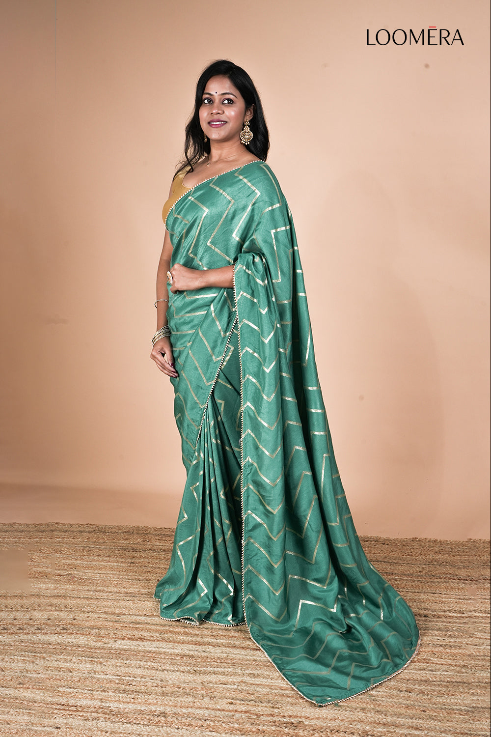 Teal Green Dola Silk Saree With Zigzag Zari Weave